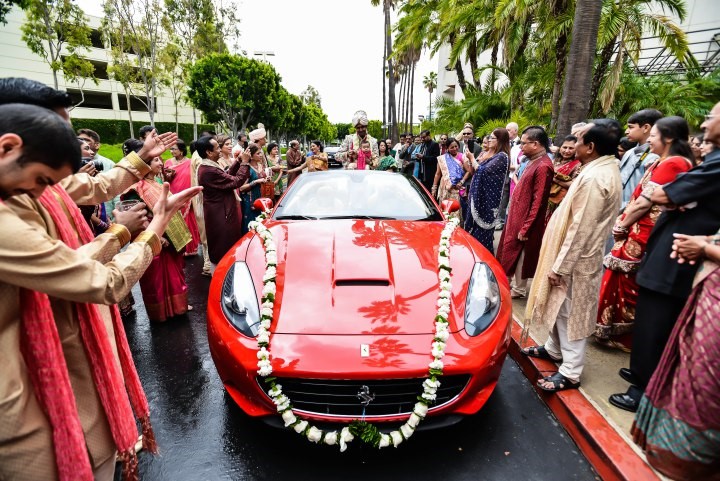 Groom arriving in exotic car